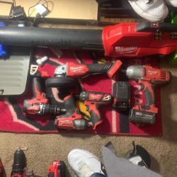 Milwaukee 3/8 Square Driv Drill Driver  1/4 6mm Driver And  A Leaf Blower And A 1/2 Impacts