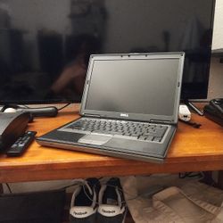DELL Latitude D630C - Comes With Charger, Disc Images, And Port Thing