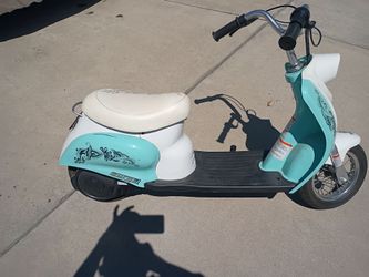 Scooter eléctrica para niños en buenas condiciones
