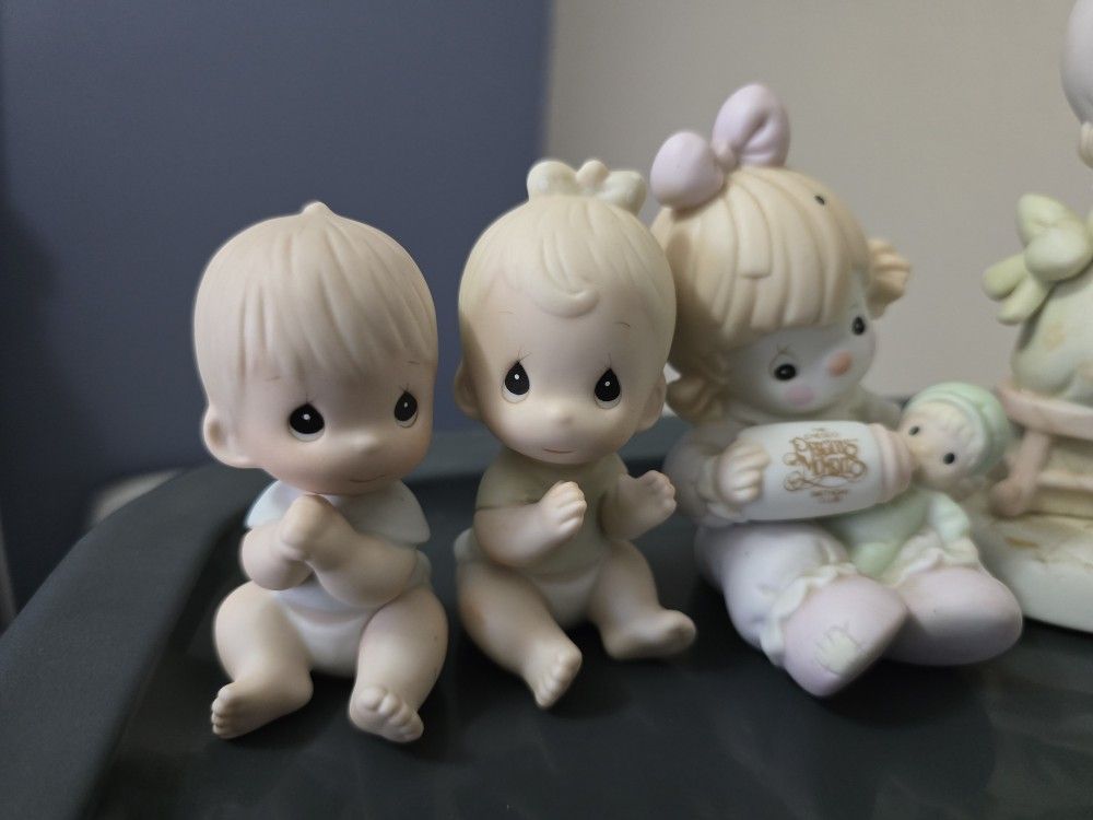 Porcelain collection of Precious Moments figurines Christmas decorations