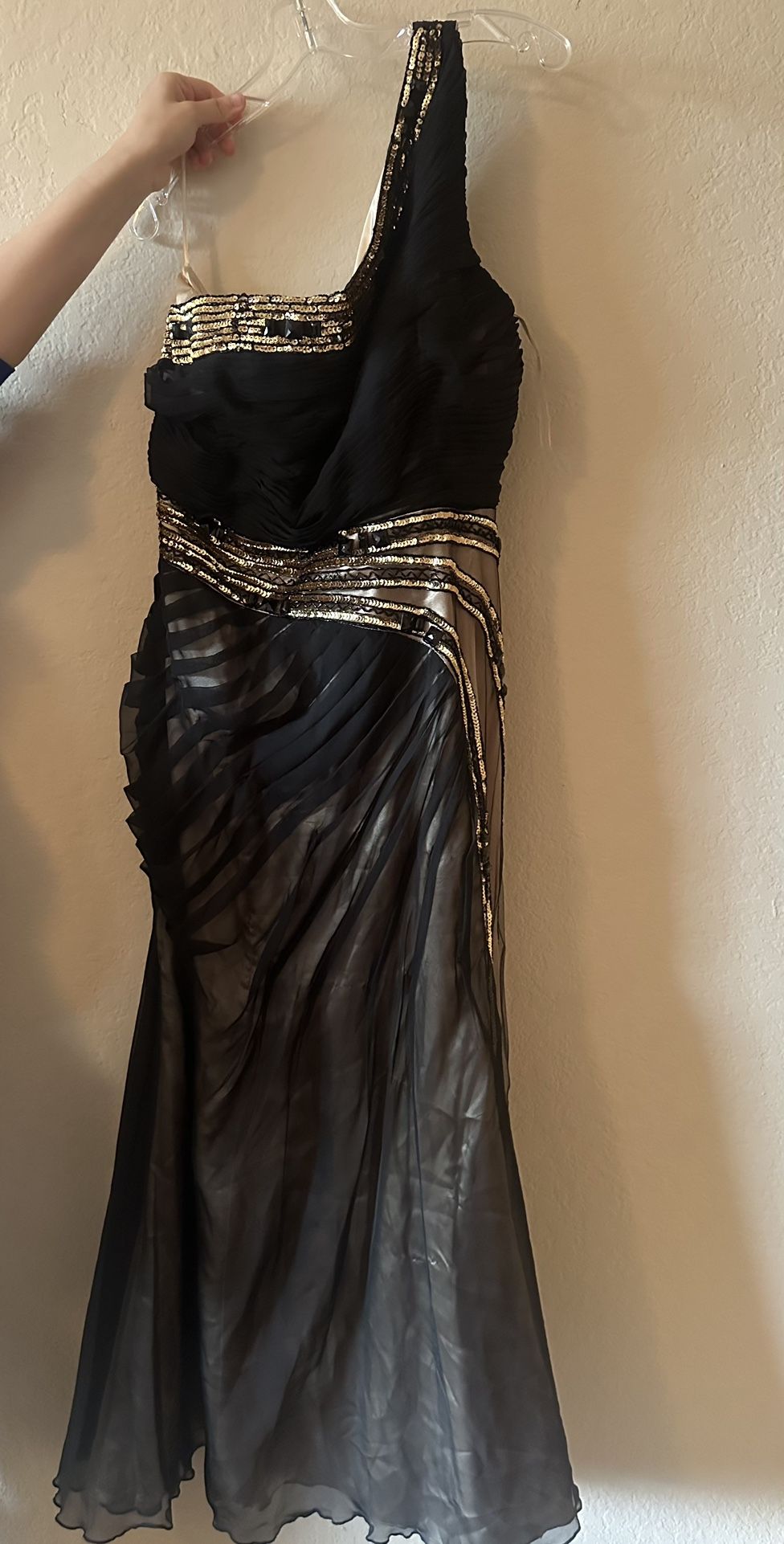 One strap black and gold dress