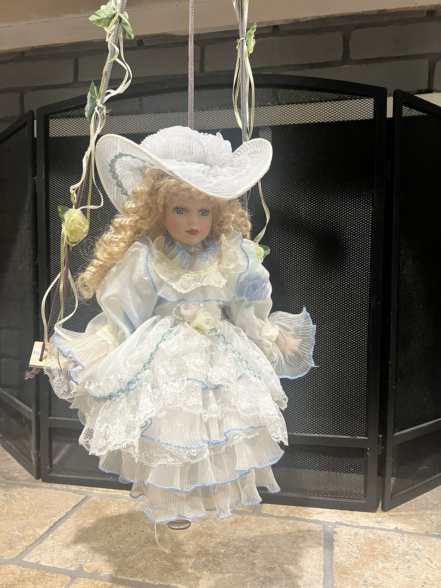 Vintage Porcelain Doll In Swing