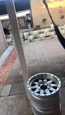 4 semi used wheels and one new one