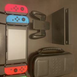 Nintendo Switch + Accessories / 6 Games