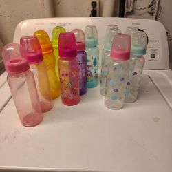 12 BABY BOTTLES 