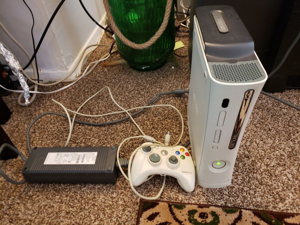 Xbox 360 with adapter and stick