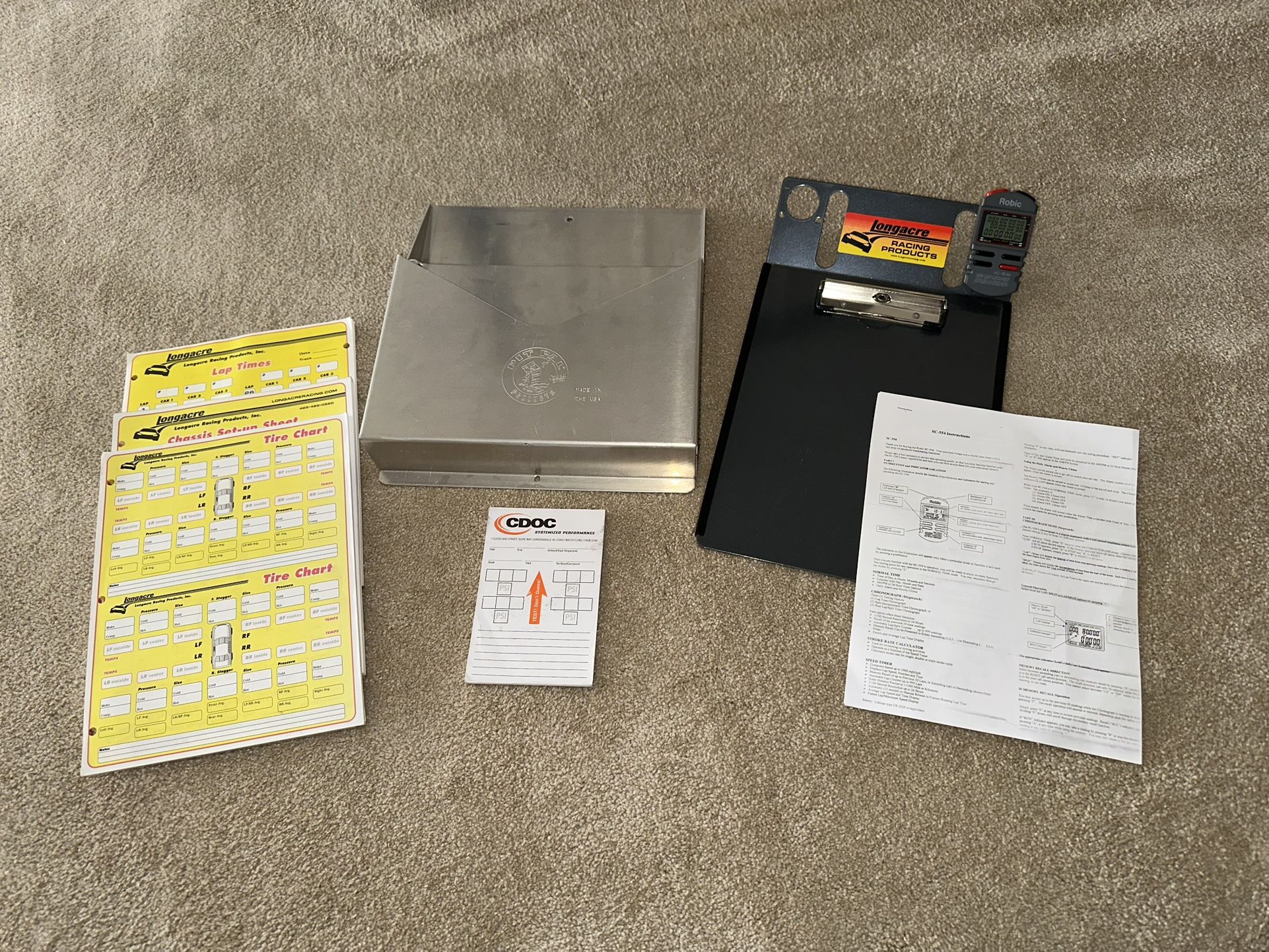 Longacre racing clipboard, aluminum PitPal logbook holder, and Lap timer