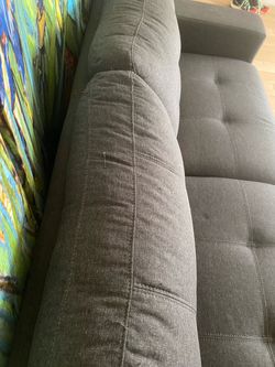 Dark gray couch/overnight bed