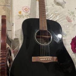 Black fender acoustic