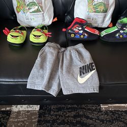(1) SHEET SET NO QUILT BRAND NEW $15 NINJA TURTLE AND MARIO SLIPPERS $10 EACH NIKE SHORTS $5