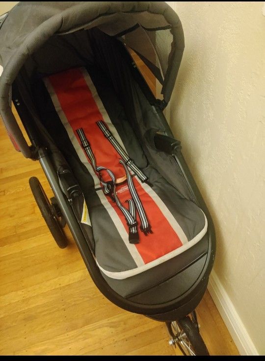 Red Graco jogging Stroller