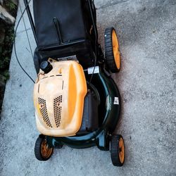 HEAVY DUTY BIG WHEEL PUSH MOWER. BAGGER, MULCHER, SIDE DISCH, ADJUSTABLE WHEELS, SHARP BLADE, WORKS 