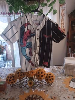 MARVELS spider man jersey with backpack friend from Disney Land, no holes, rips or stains.