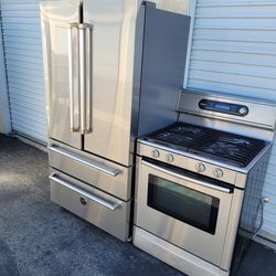 Bertazzoni Italia refrigerator stainless steel and bosch gas stove with 4 burners