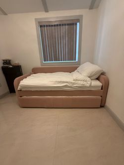 pink twin daybed with pop up trundle- mattress inc!