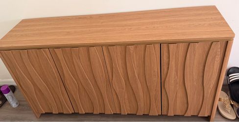 Wood Tone Sideboard with Wave Door Detail