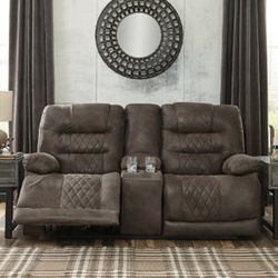 Brown loveseat