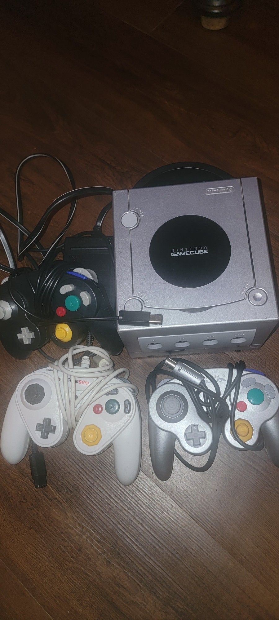 Gamecube with 3 controllers also mario kart sonic riders and resident evil