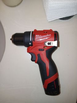 Milwaukee subcompact brushless drill/driver  with red lithium cp2.0 battery included together