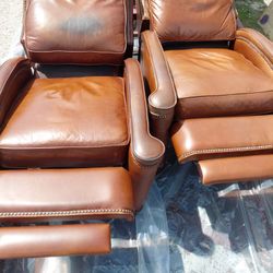 Two matching leather recliners