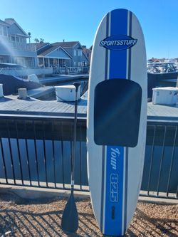 Paddle also surf board