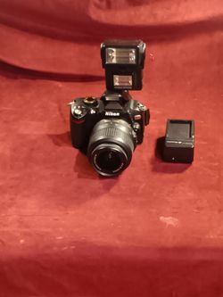       Nikon D60 camera  Nikon 18-55mm f/3.5-5.6G AF-S DX VR Nikkor Zoom Lens and 
Nimslo Opti-Lite Flash | Bounce | - EX+
with one battery and charger