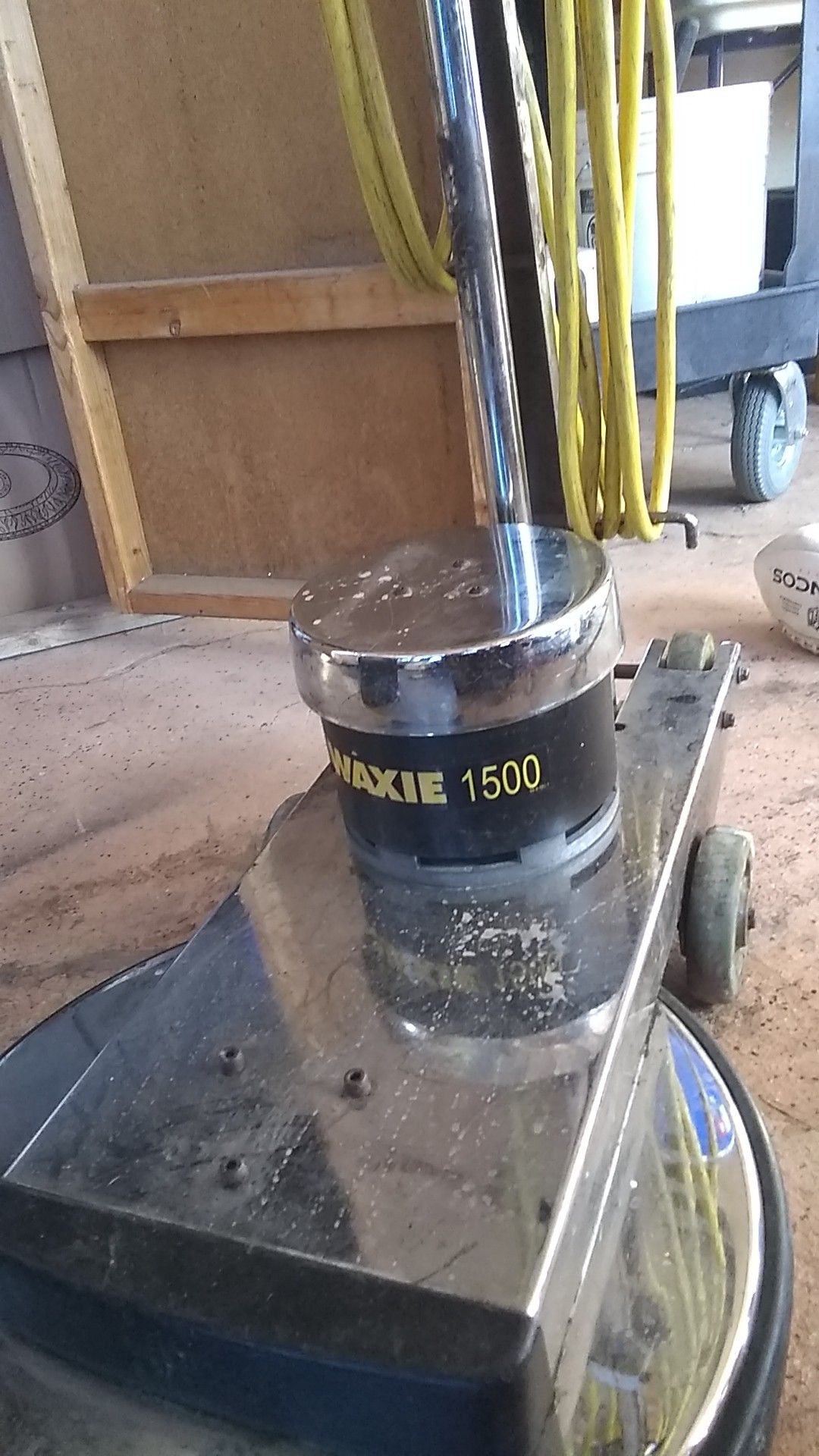 A waxy 1500 floor scrubber in good condition floor buffer with a 5 gallon bucket of wax asking $450 or best offer