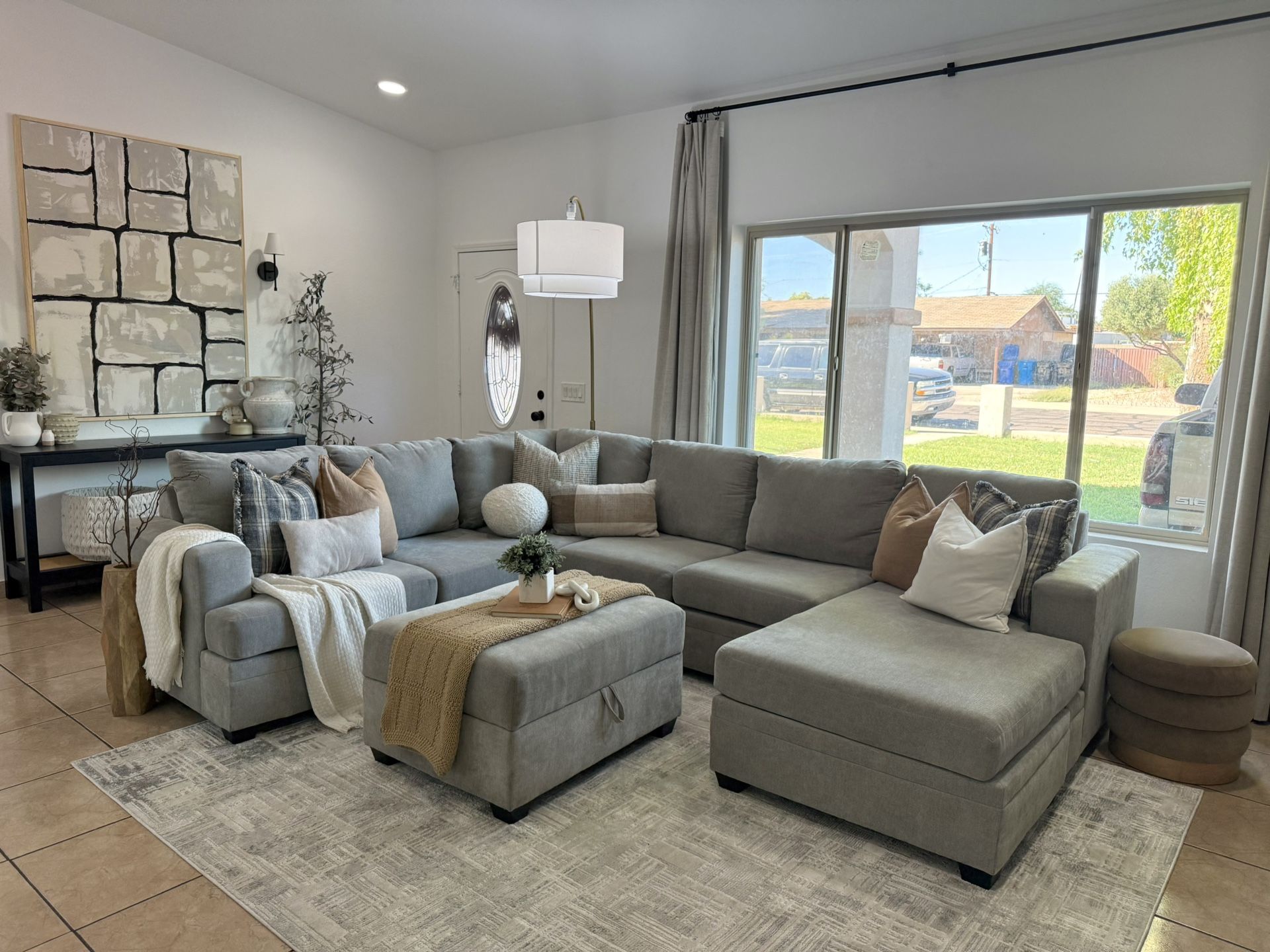 Living Spaces Grey Sectional With Ottoman