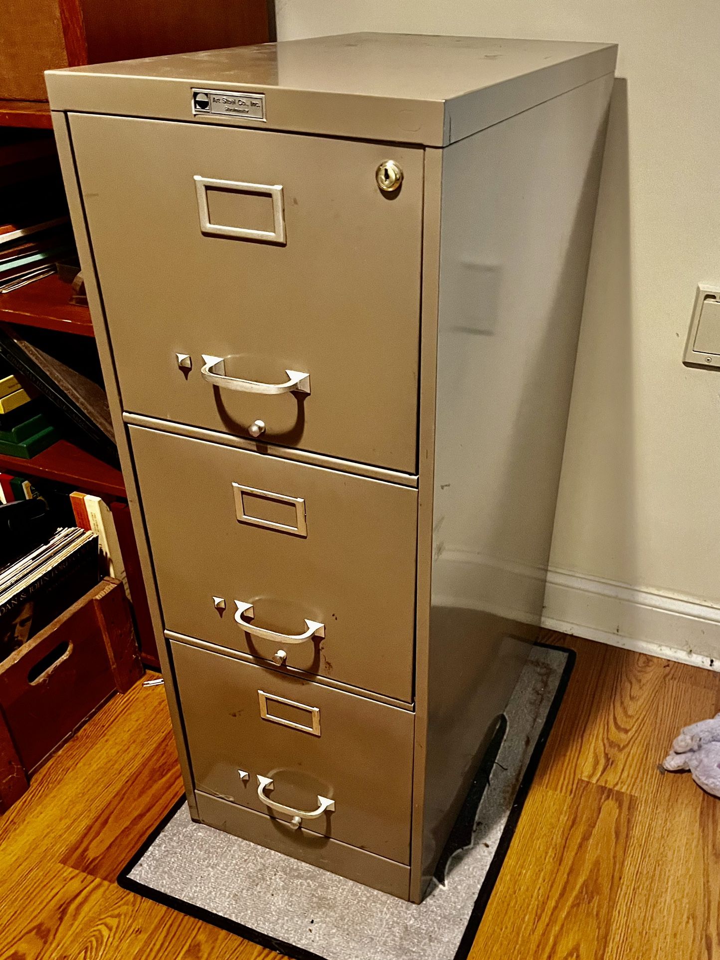 Steel Back Here, Early Auction Master Three Drawer File Cabinet