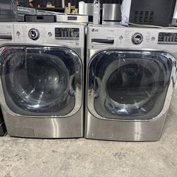 LG jumbo Stainless steel front load washer and gas dryer set