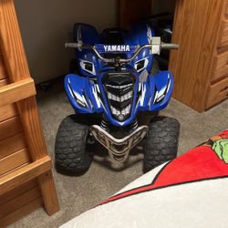 Child’s 4-Wheeler With Charger