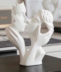 Couple kissing ornament