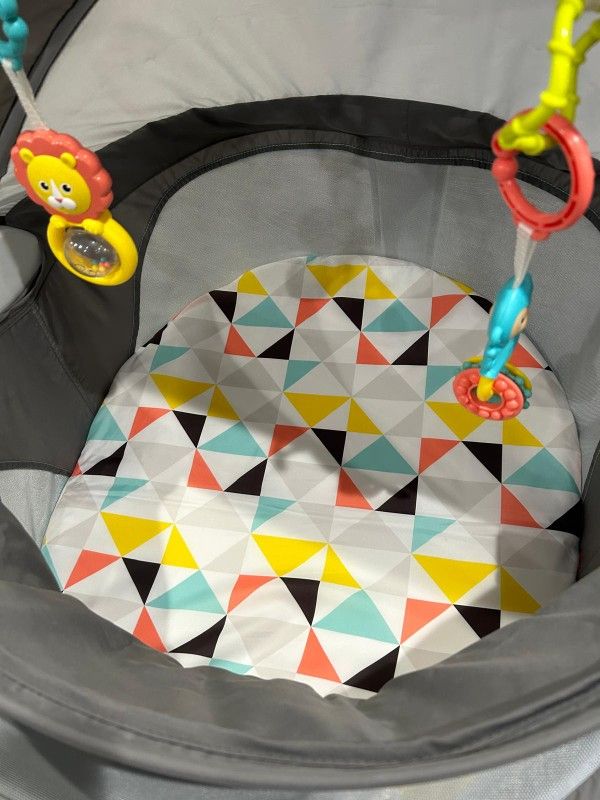 Fisher-Price Portable Bassinet On-The-Go Baby Dome, Travel Play Space with Developmental Newborn Toys & Canopy, Windmill