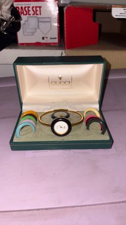 Gucci Bangle Watch with Interchangeable Bezels