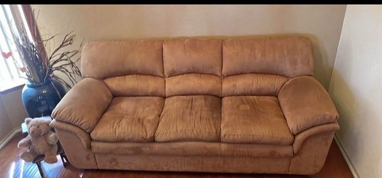 Large beautiful beige 3 seater sofa.