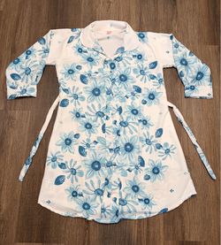 Blue floral print button-up shirt with tie waist