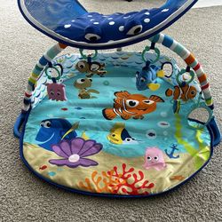 Bright Starts Disney Baby Finding Nemo Mr. Ray Ocean Lights & Music Gym, Ages Newborn