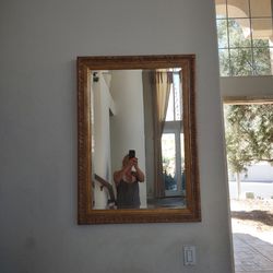 Large beveled mirror with gold trim 42"x 30"