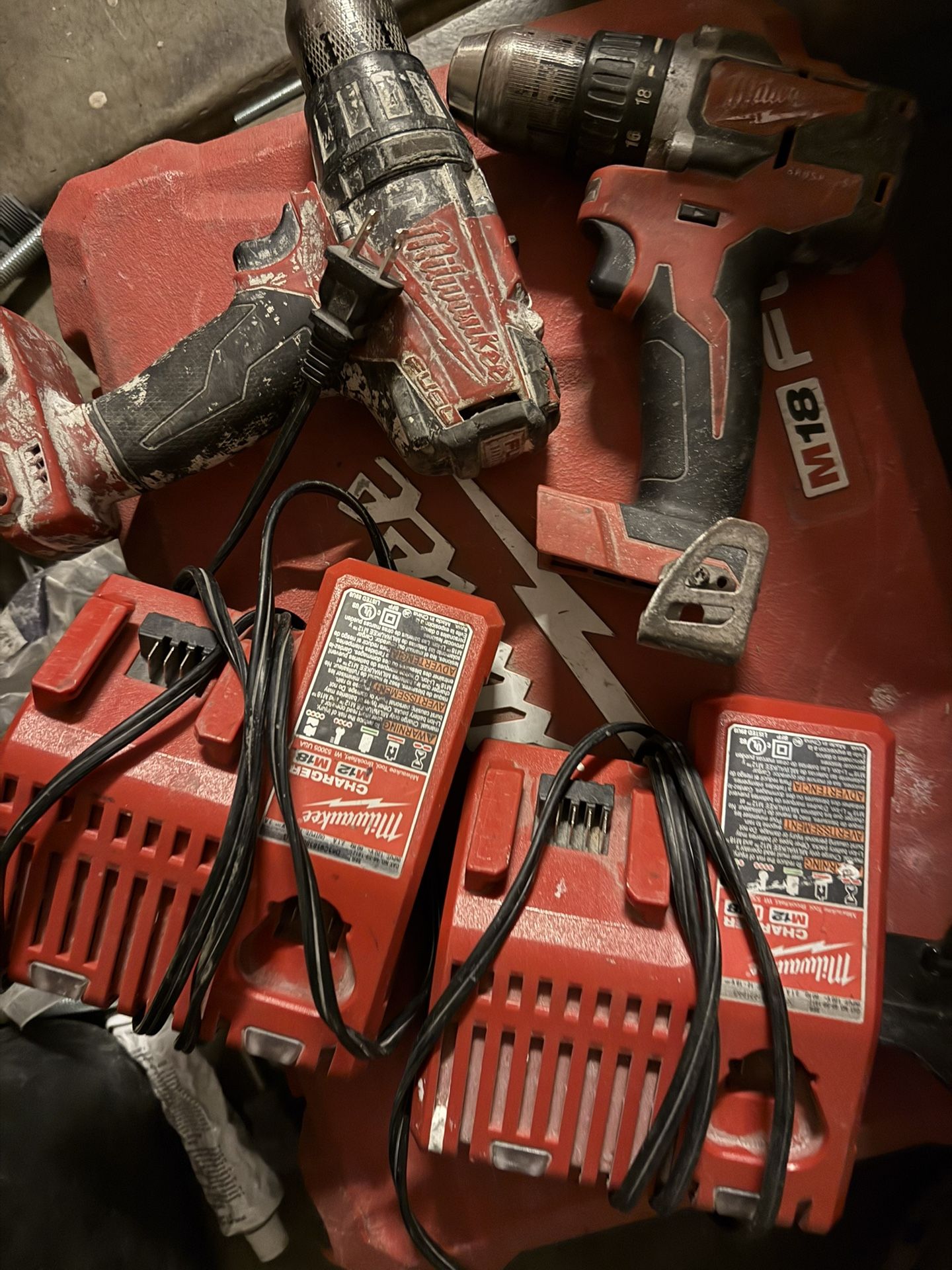 2 Milwaukee Drills And 2 Chargers