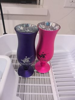 Two medieval times glasses pink purple