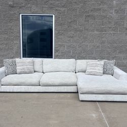 Off White - Rooms To Go Sectional Sofa w/ Reversible Chaise