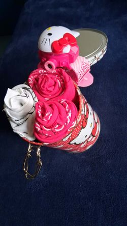 Hello kitty tin with watch and bandana flowers