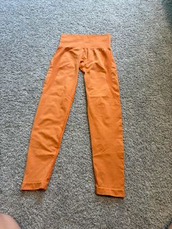 NVGTN Orange High-Waisted Seamless Leggings Women’s Size XS. Spandex & nylon blend