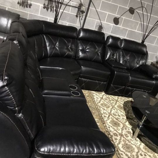 Black Reclining Tufted Leather Sectional