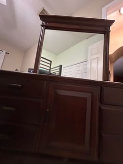 Queen size Sleigh bed plus dresser, mirror, and nightstand