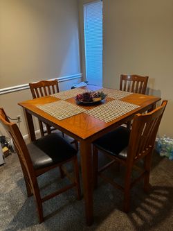 4-seater wooden dining set