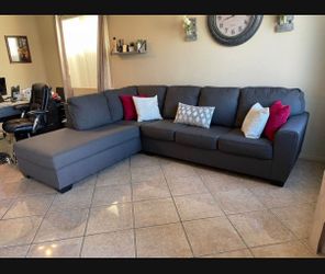 Beautiful Charcoal Grey Sectional couch from living Spaces LIKE NEW