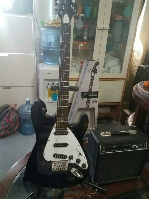 First Act Double Cutaway Electric Guitar Complete Set With Stand And First Act Double Cutaway Electric Guitar Complete Set With Stand And Amp Cable