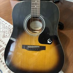 Epiphone Songmaker DR-100 acoustic guitar in a vintage sunburst finish