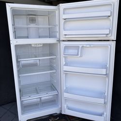 White refrigerator top freezer and fridge